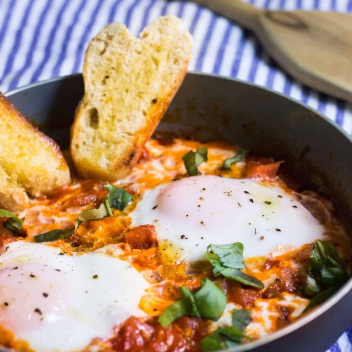 Eggs in Tomato Sauce: a quick, French dinner made with minimal ingredients. Recipe via MonPetitFour.com