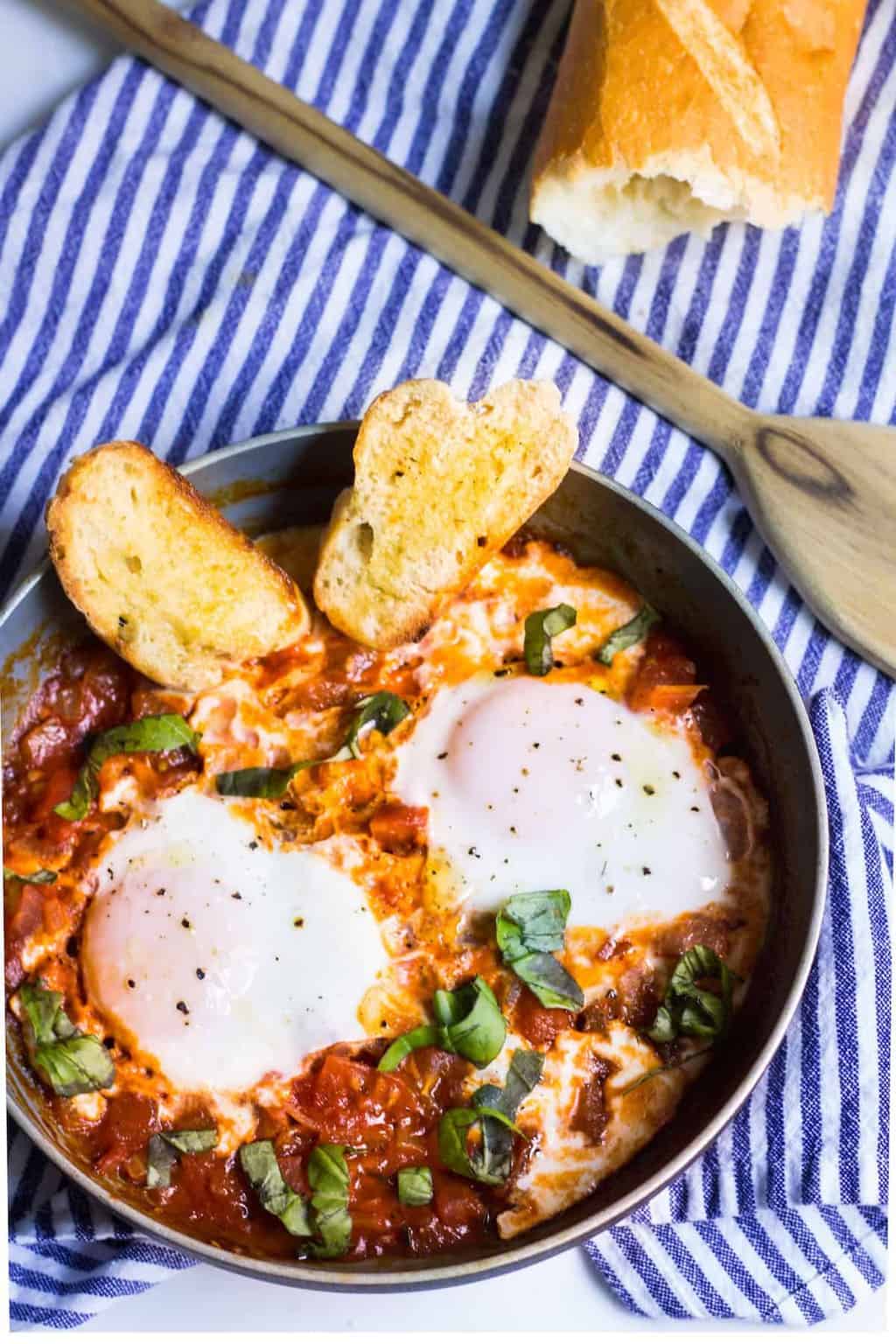 Eggs in Tomato Sauce: a quick, French dinner made with minimal ingredients. Recipe via MonPetitFour.com