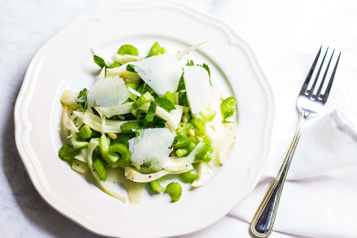 Fennel Salad: a light and refreshing mix made up of fennel, celery, pine nuts, and parmesan shavings. Recipe via MonPetitFour.com