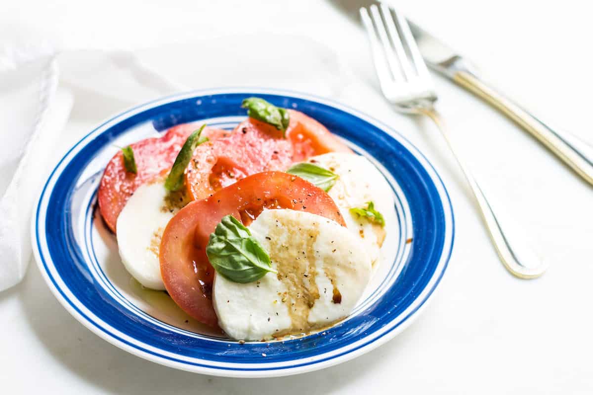 Tomato Mozzarella Salad with fresh basil! Recipe via MonPetitFour.com