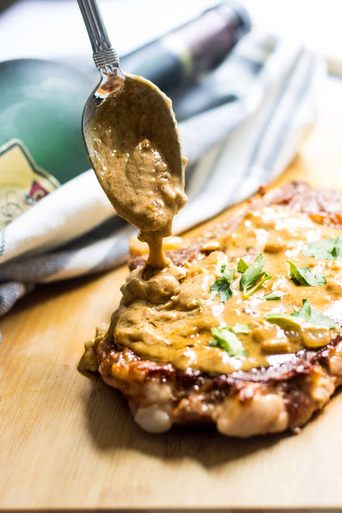 Steak Diane: A French twist on steak cooked with a dijon cream sauce and a little flambé action. Recipe via MonPetitFour.com