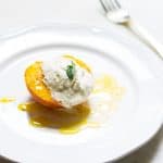 Baked Peaches with Cream: a quick and easy summer dessert made with ripe peaches and freshly whipped cream. A French recipe known as pêches rôties. Recipe via MonPetitFour.com