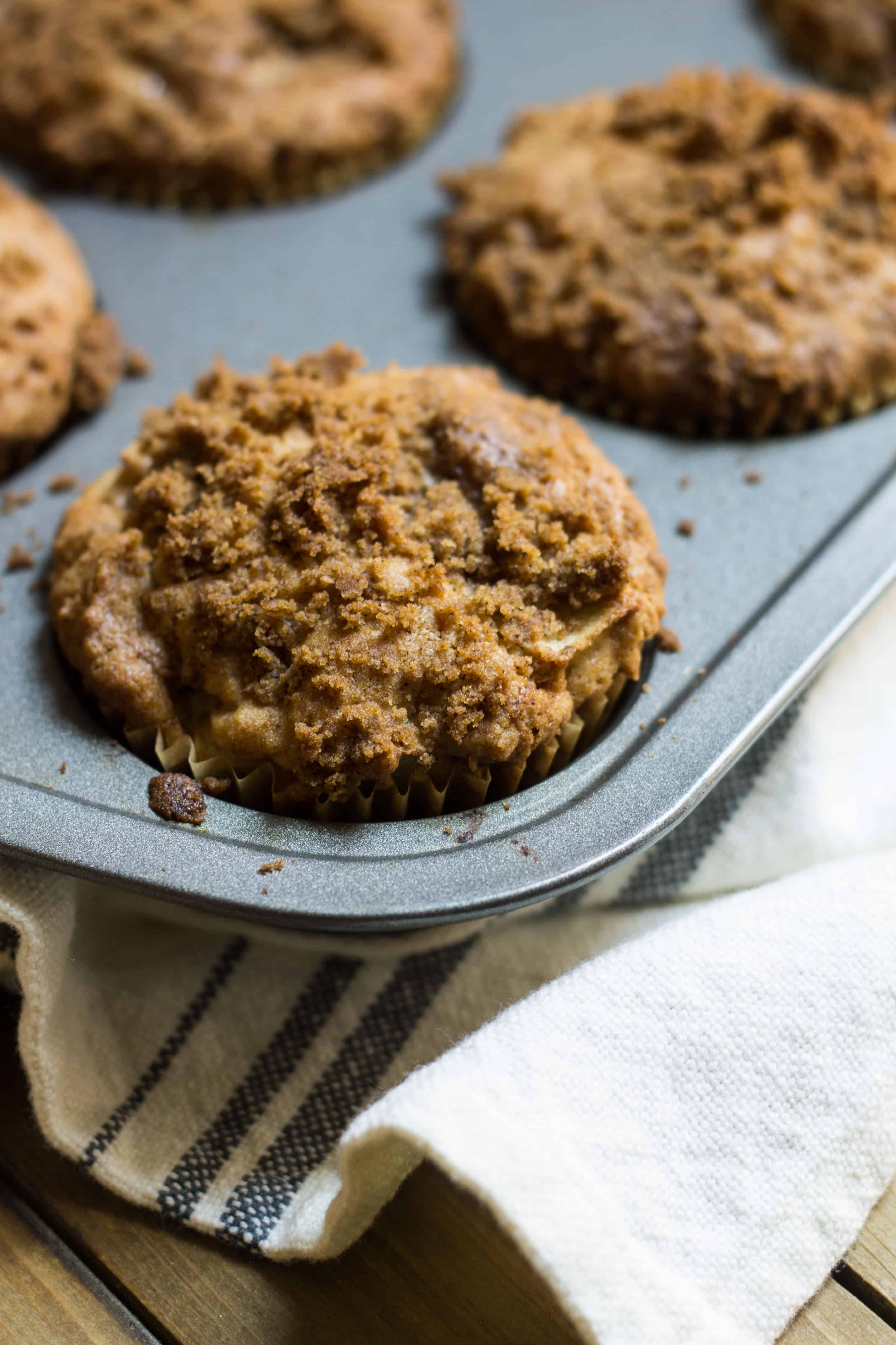 Apple Muffins: easy, tender apple muffins with a crisp, streusel topping. Perfect fall recipe via MonPetitFour.com