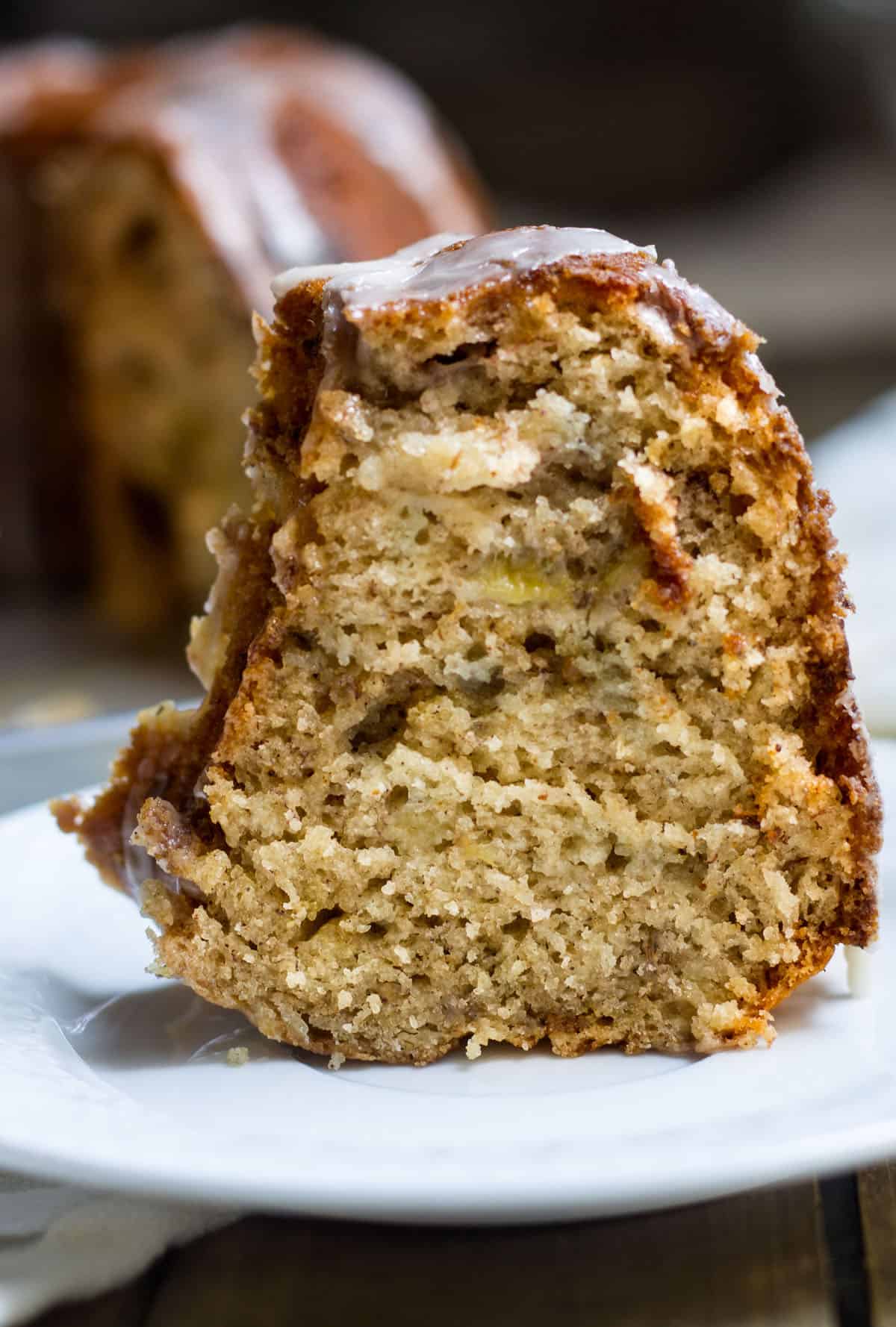 Apple Bundt Cake: a delicious and easy fall cake recipe made with apples, bananas, and fall spices. Recipe via MonPetitFour.com
