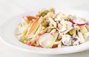 Apple Fennel Salad: a fall salad made with apples, fennel, Belgian endive, radishes, and a blue cheese vinaigrette. Easy, light, and delicious! French recipe via MonPetitFour.com