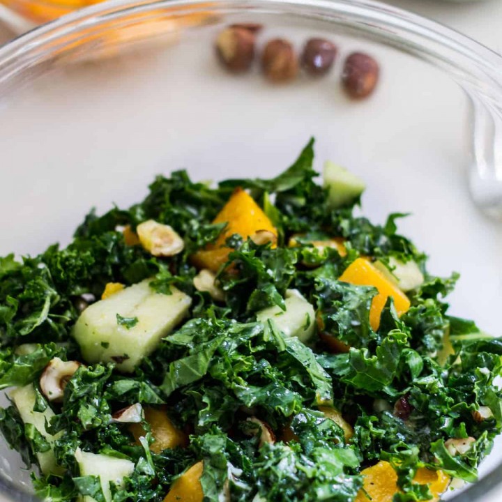 Kale Butternut Squash Salad: an easy fall salad with a tasty maple vinaigrette. Perfect for the holidays too! Recipe via MonPetitFour.com