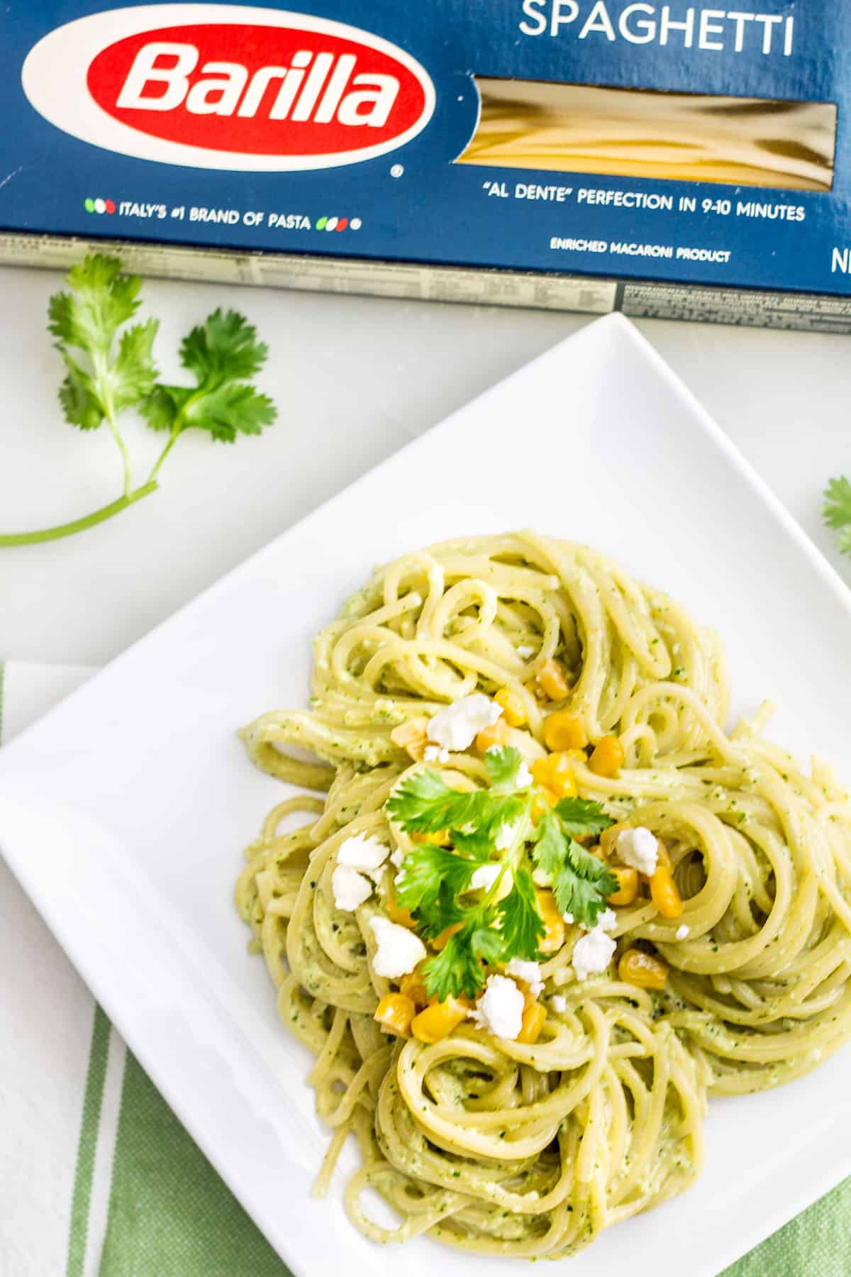 Pasta Poblano: a creamy pasta recipe made with poblano chiles, jalapeño, cilantro, and fresh crema sauce. Tasty, quick, and easy weeknight dinner! Recipe via MonPetitFour.com