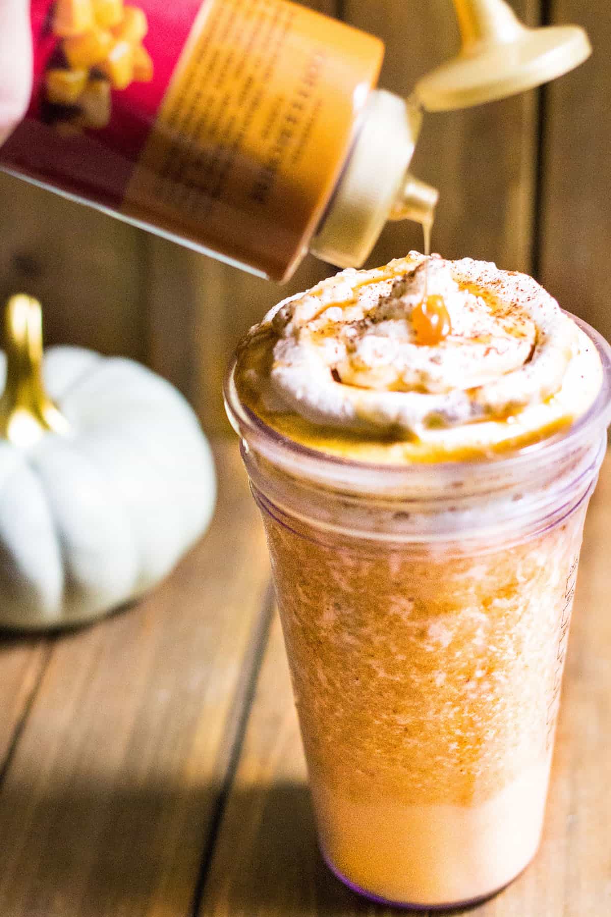Pumpkin Spice Frappé: a rich and creamy blended drink flavored with pumpkin and pumpkin pie spice. Made with Torani Real Cream Plain Frappé Mix. Recipe via MonPetitFour.com #ad #MyToraniFrappe