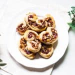 Savory Palmiers made with brie, walnuts, cranberry jelly, and Pepperidge Farm® Puff Pastry Sheets. A crowd-pleasing appetizer for any occasion or holiday! French recipe via MonPetitFour.com #ad #InspiredbyPuff