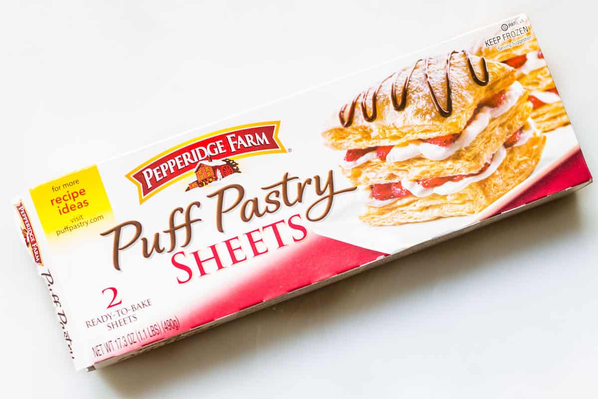 Savory Palmiers made with brie, walnuts, cranberry jelly, and Pepperidge Farm® Puff Pastry Sheets. A crowd-pleasing appetizer for any occasion or holiday! French recipe via MonPetitFour.com #ad #InspiredbyPuff