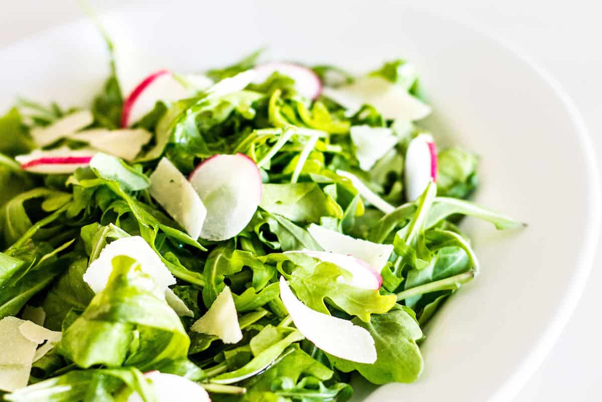 Arugula Salad with Parmesan: a quick and easy, go-to salad for everyday meals and entertaining. French recipe via MonPetitFour.com