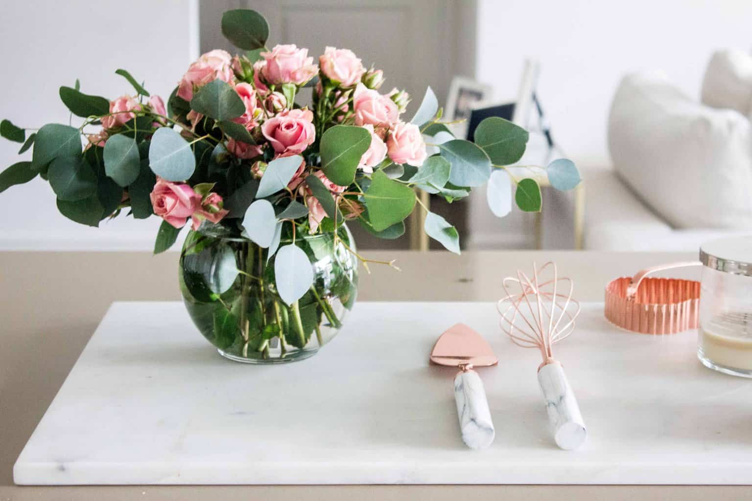 Small floral arrangements with pink roses and eucalyptus via MonPetitFour.com