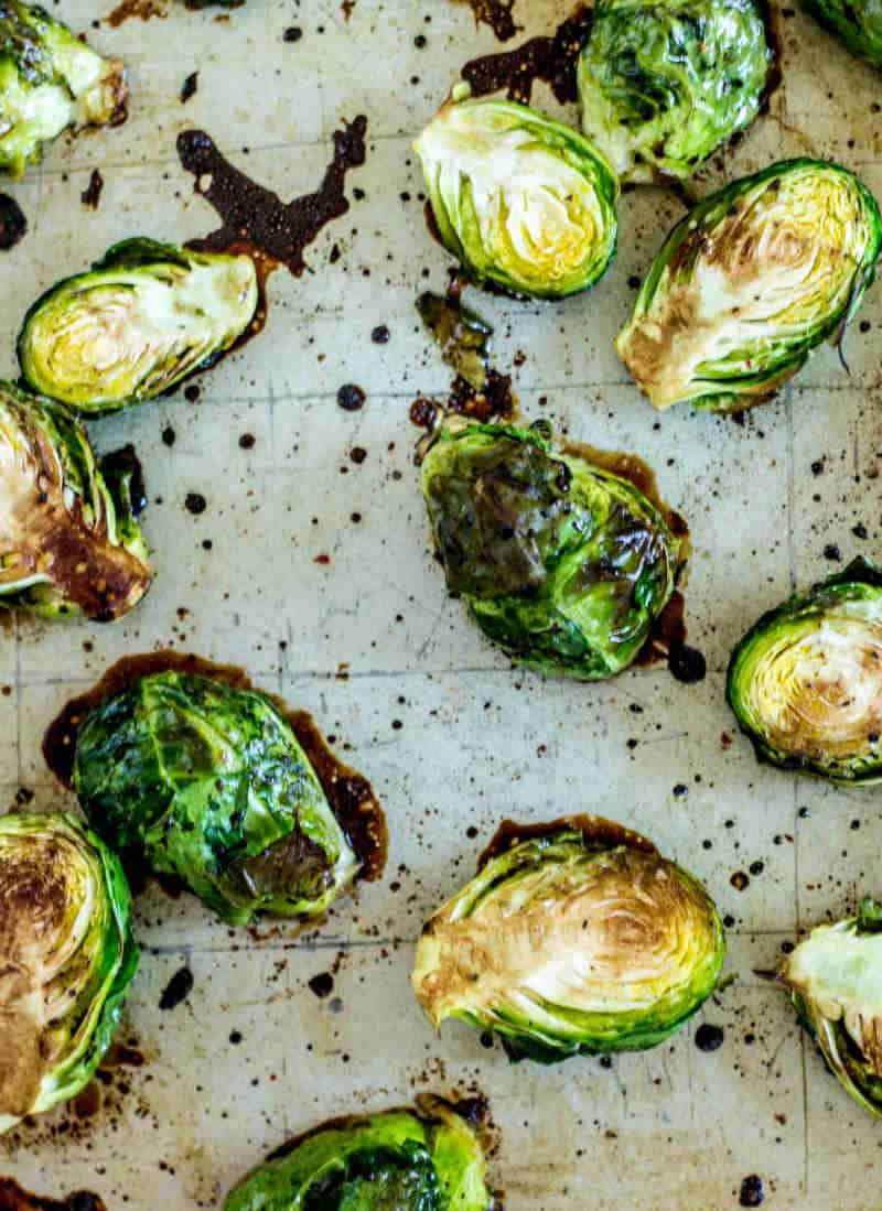 roasted brussels sprouts on a baking sheet close up