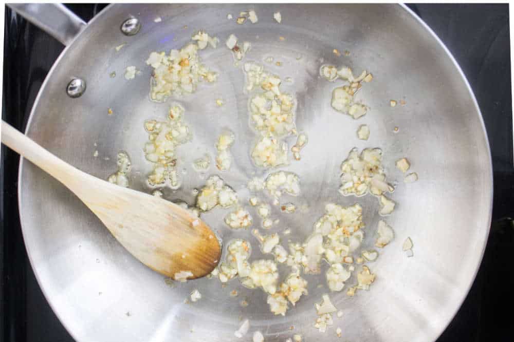 Simple Bolognese Recipe garlic and shallots being sautéed