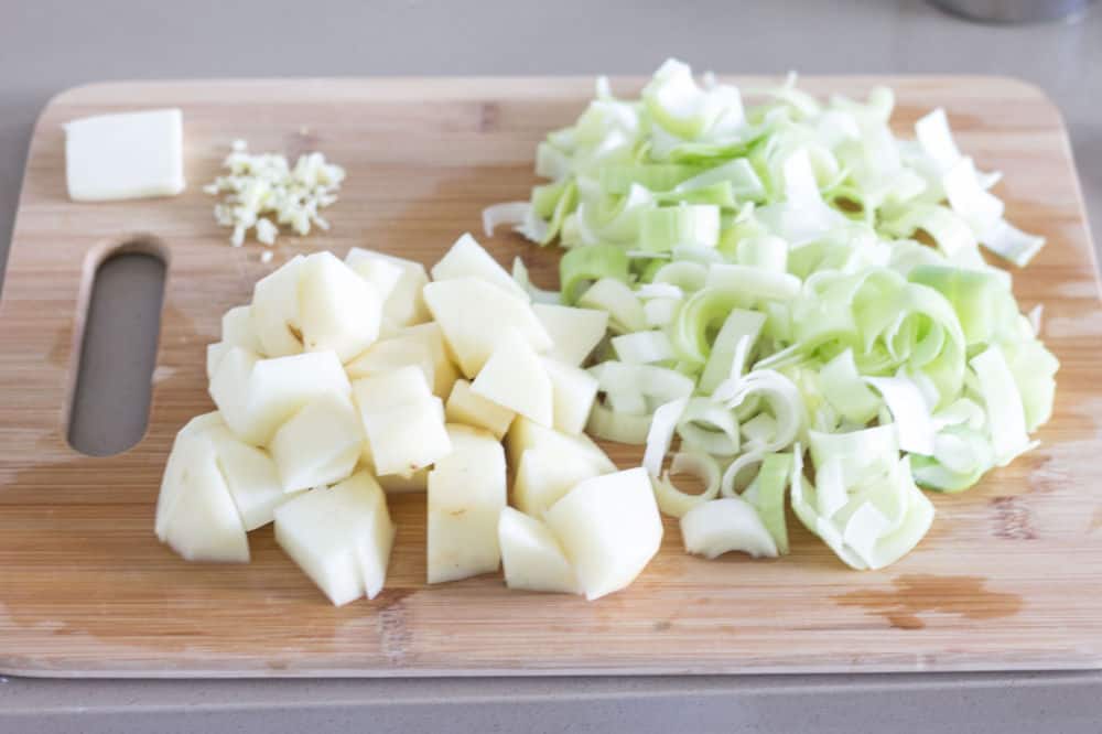 leek soup mis en place chopped leeks potatoes butter and garlic