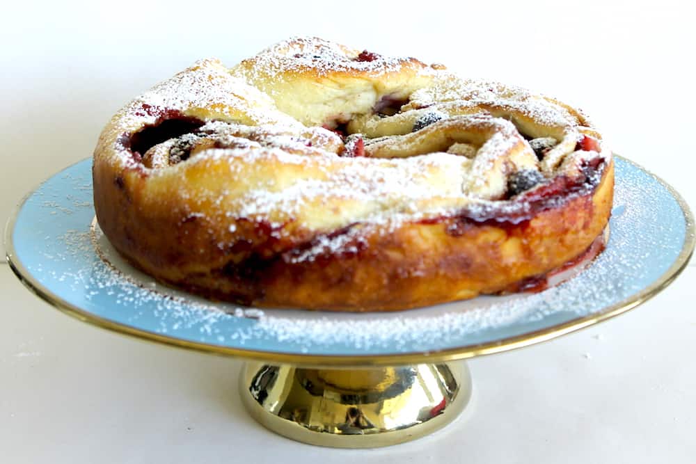 Braided Bread on a cake stand image