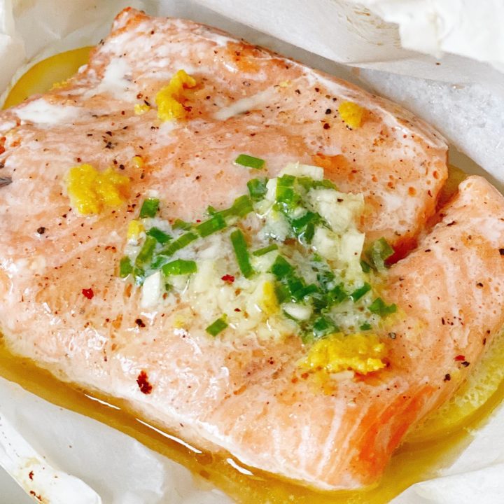 piece of salmon in parchment paper image