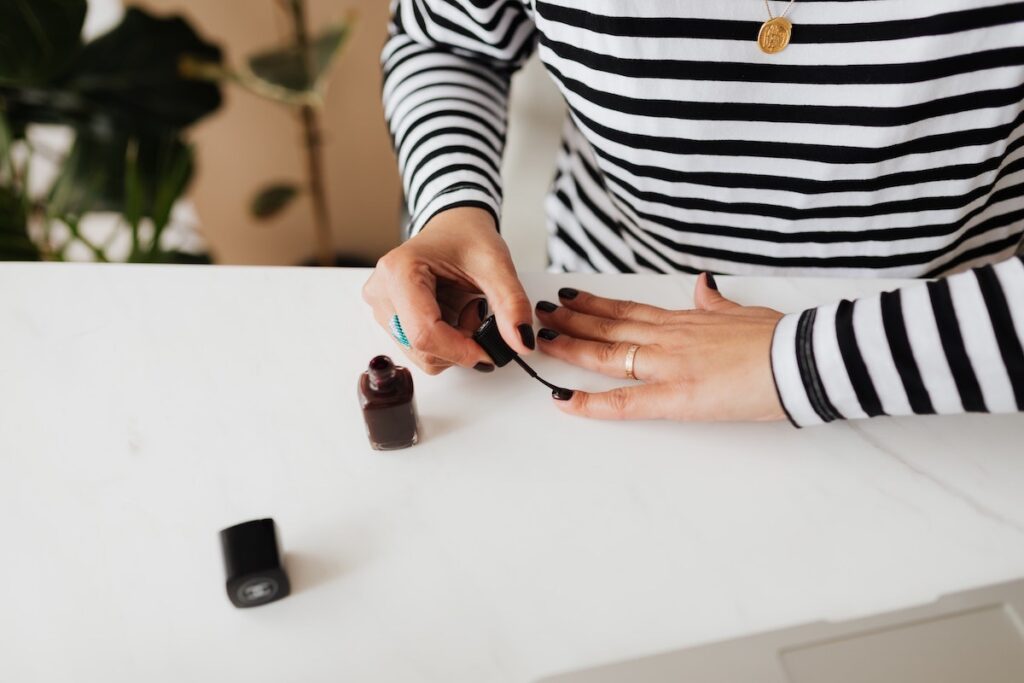 applying autumn nail colors image