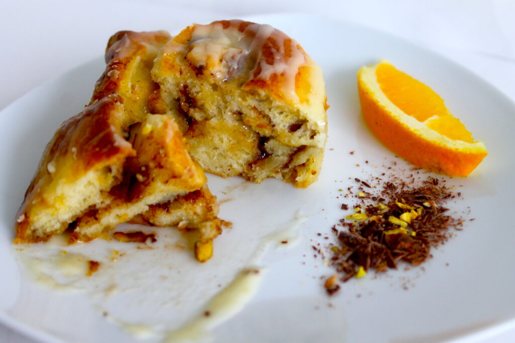 homemade cinnamon roll cut up image