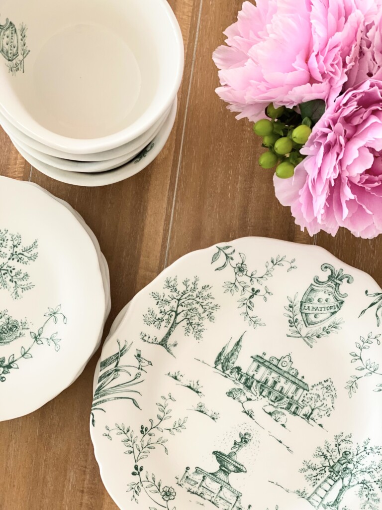 set of French style plates and bowls