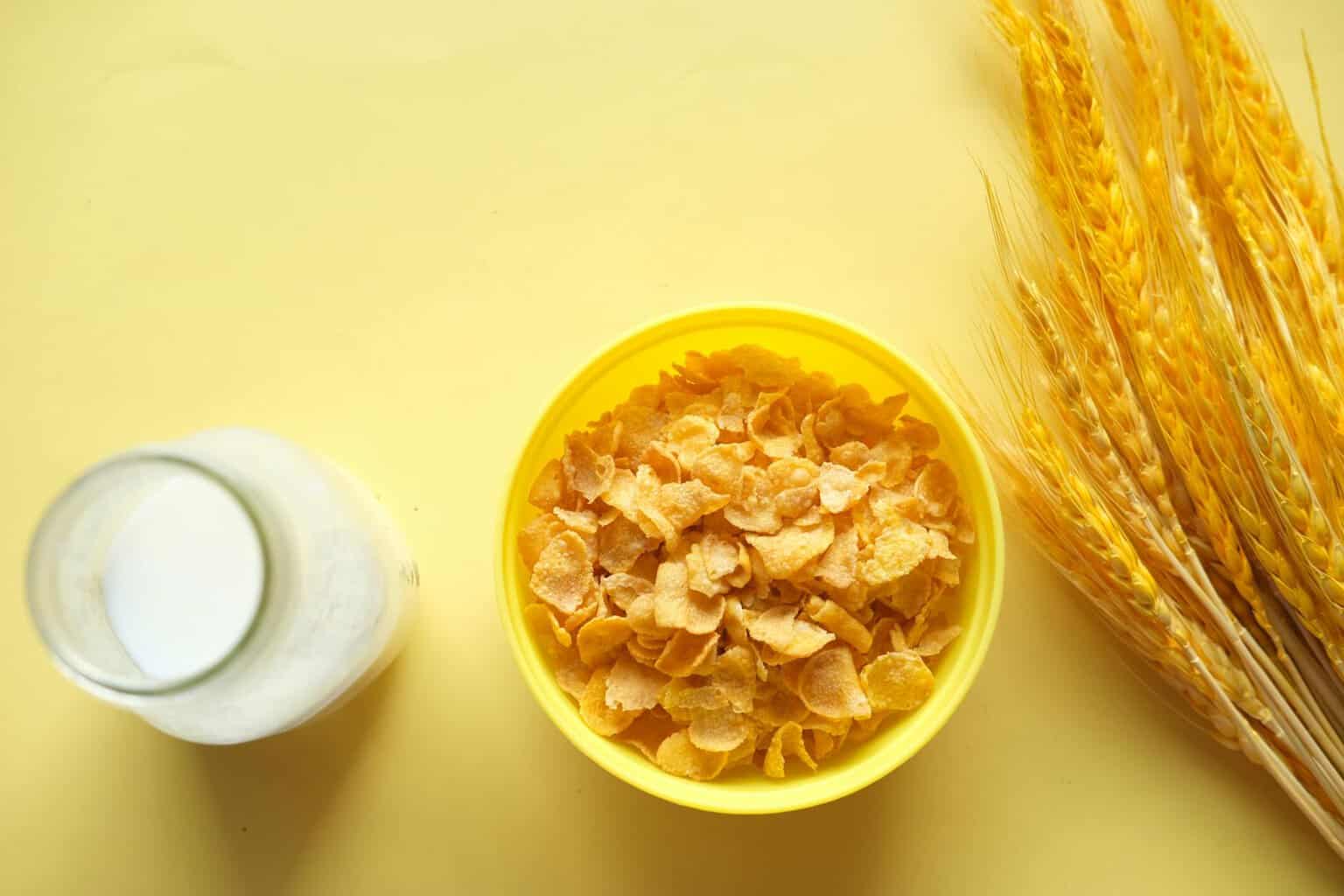 corn flakes on yellow plastic bowl