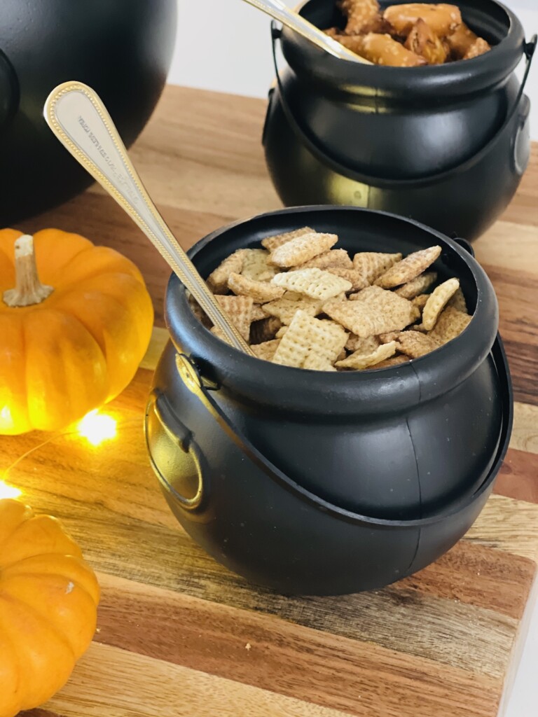 chex mix cereal in a mini plastic cauldron