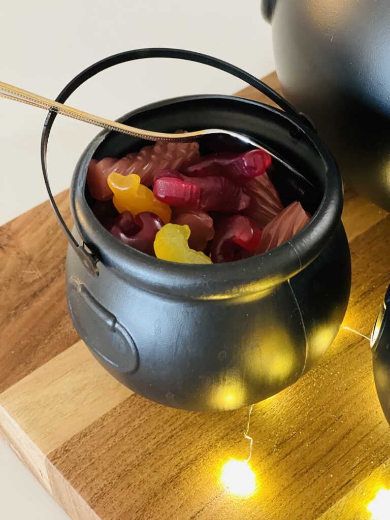 gummy candies in a mini plastic cauldron