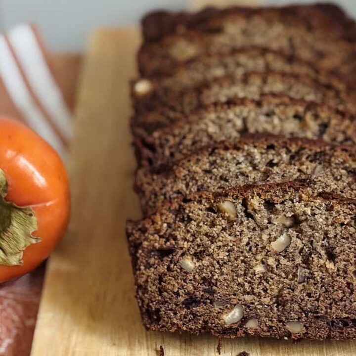 persimmon bread recipe loaf next to hachiya persimmon