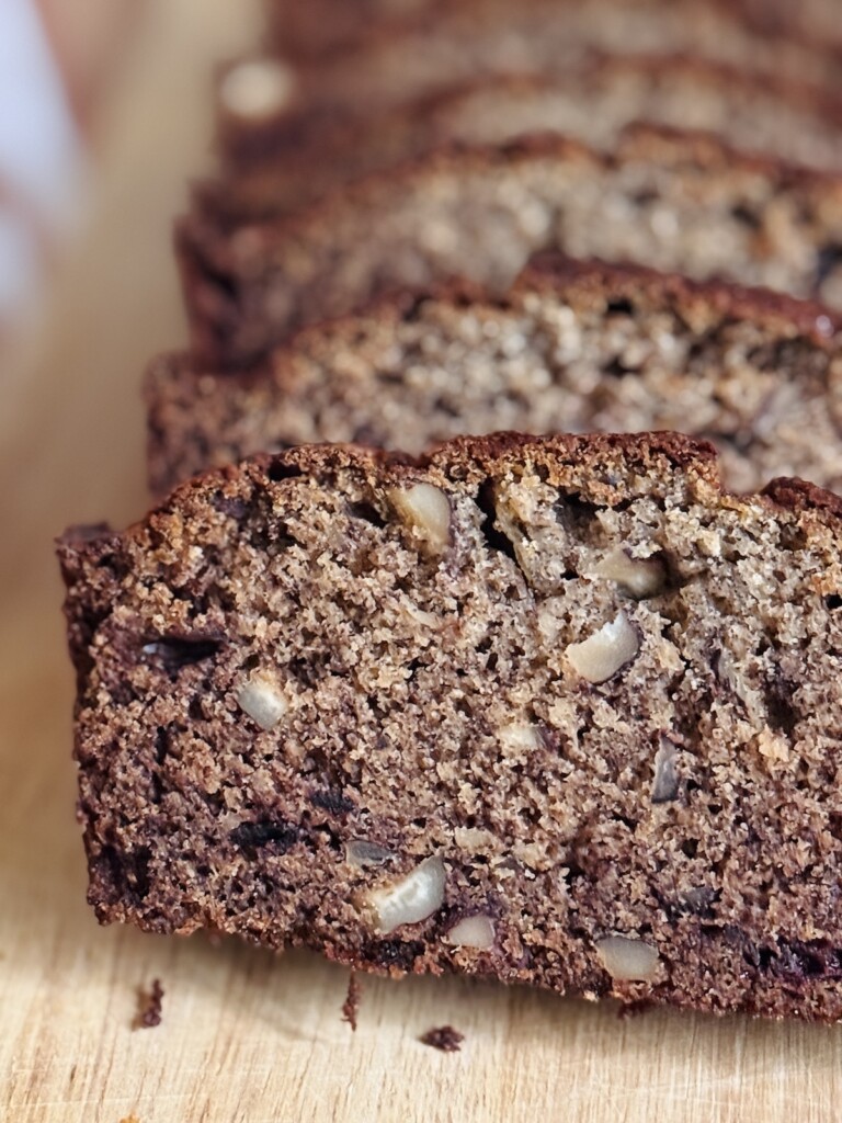 up close view of persimmon bread with hazelnuts inside