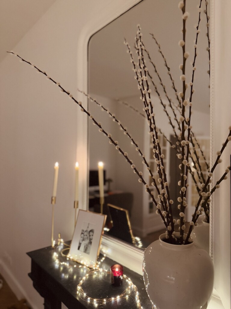 flowers on the mantlepiece in a paris apartment image