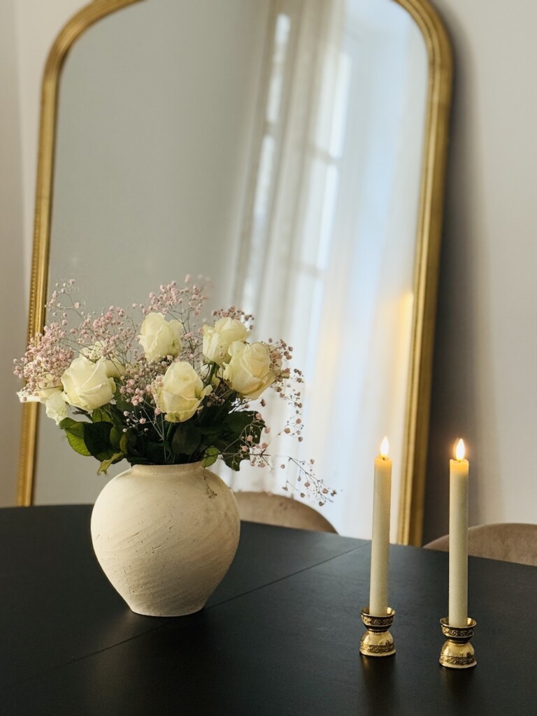 white roses in a parisian apartment image